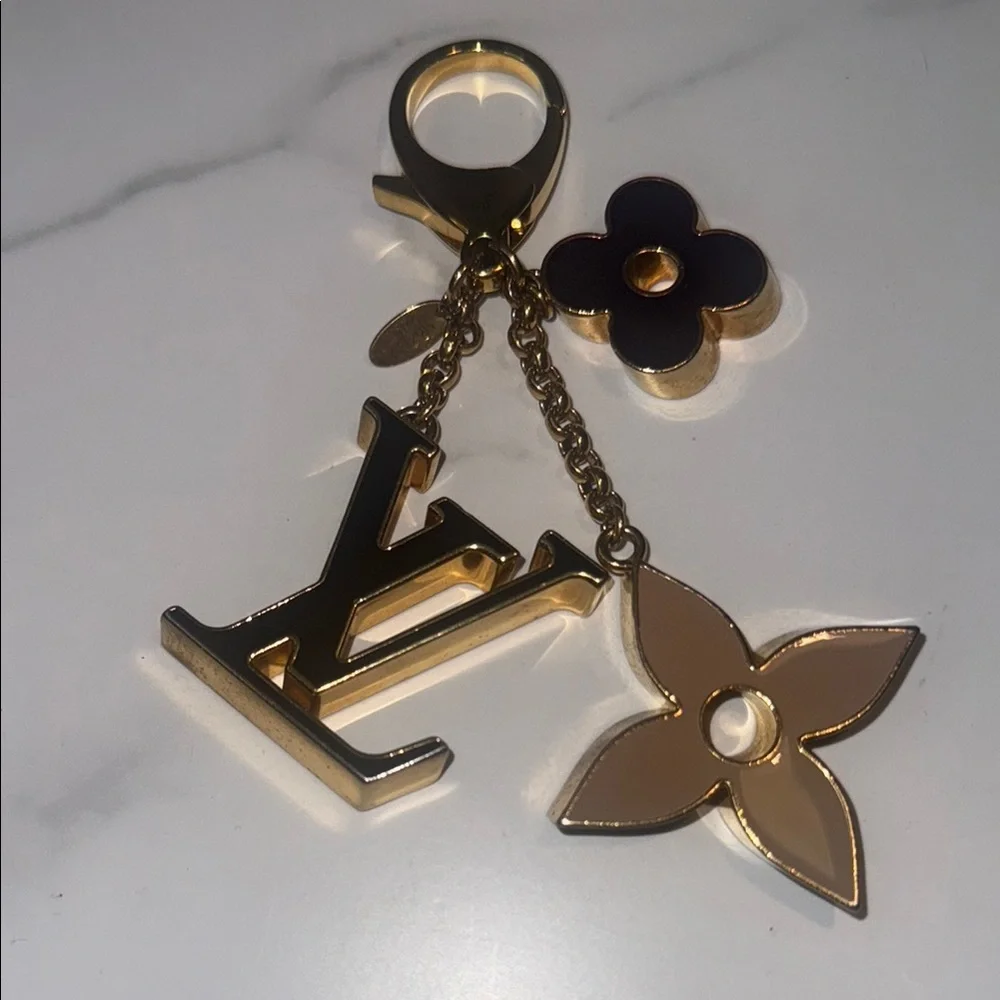 Louis Vuitton Fleur De Bag Charm in Gold Tone with Blush, Purple, and Black - Picture 4 of 8